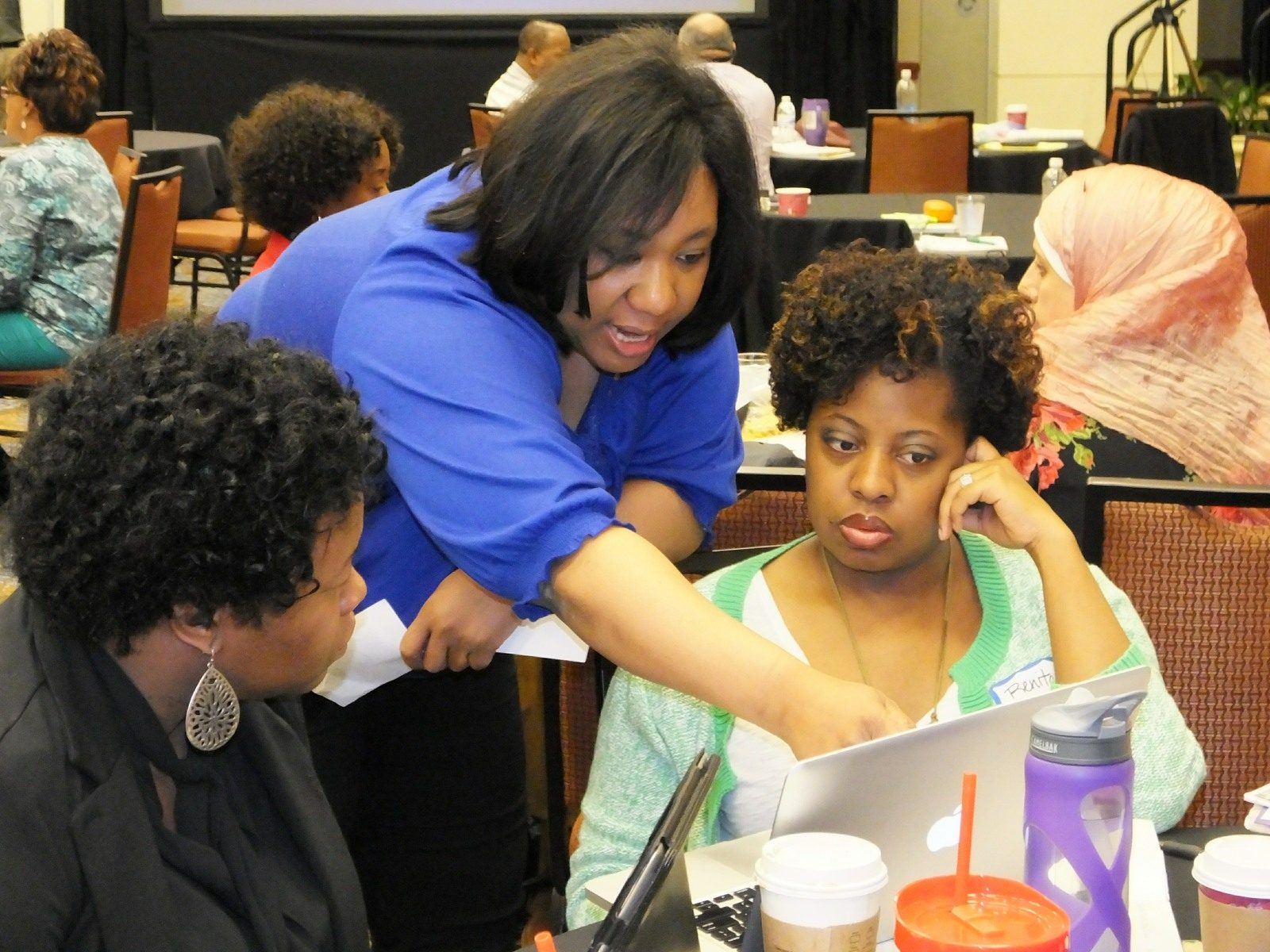 Teachers collaborating during a session